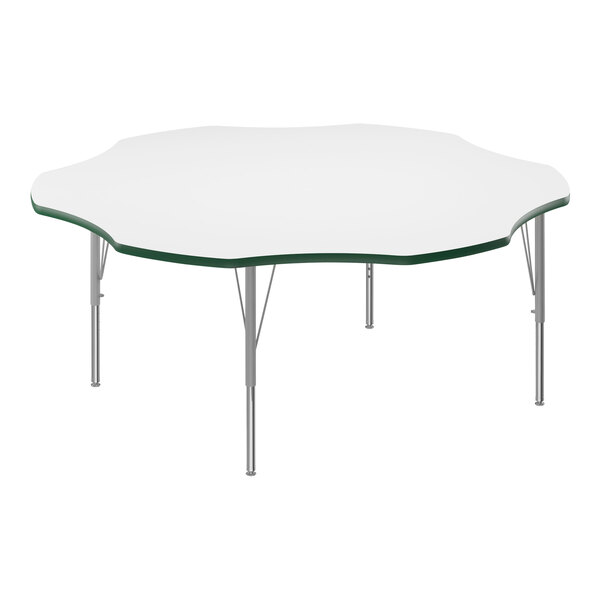 A white table with a metal frame and green edge.