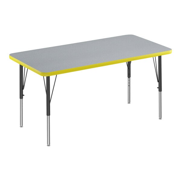 A grey rectangular Correll activity table with black legs and yellow edge.