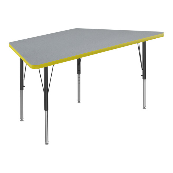 A grey and yellow trapezoid activity table with black legs.