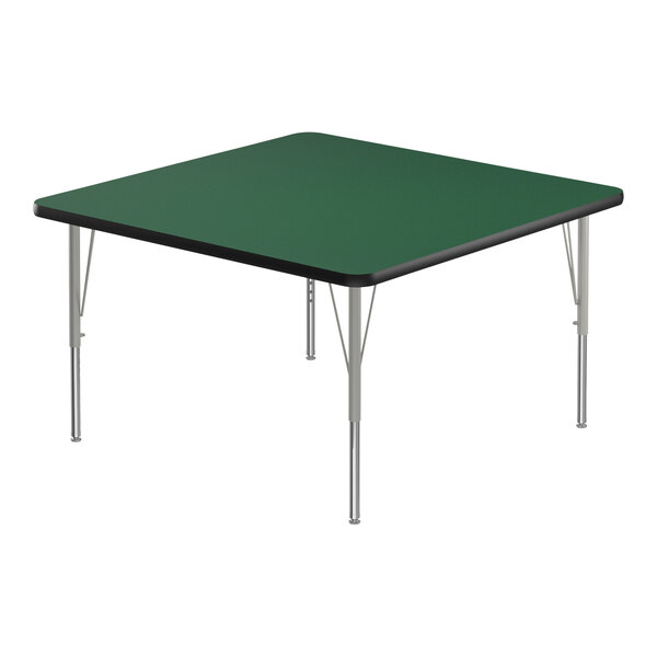 A square green Correll activity table with silver legs and black edges.