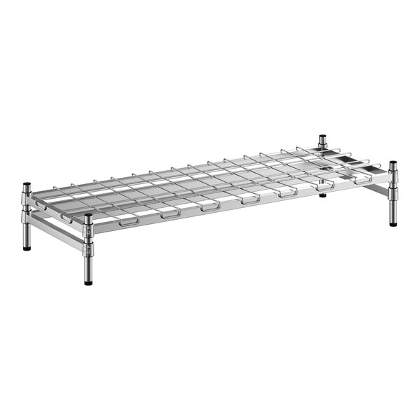 A Regency stainless steel wire dunnage rack with metal legs and wire mat.