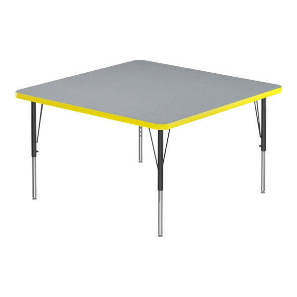 A grey square activity table with black legs and yellow trim.