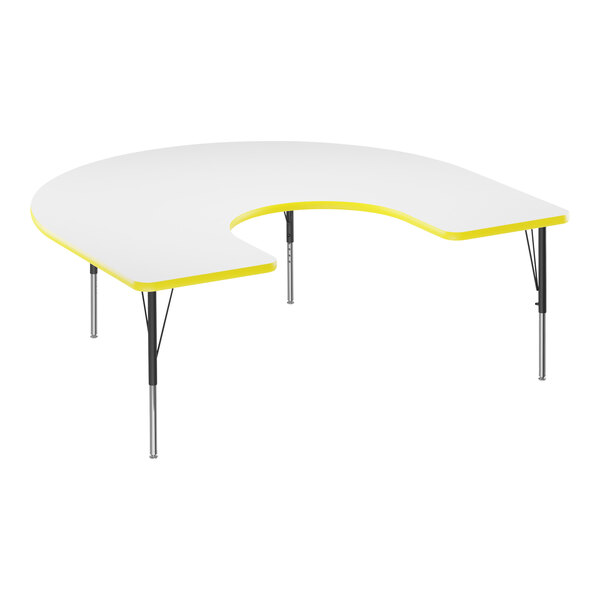 A white Correll horseshoe activity table with yellow T-mold.