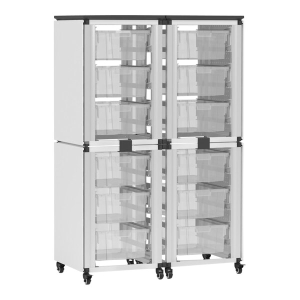 A black and white Luxor storage cabinet with whiteboards and pegboards with clear plastic bins.