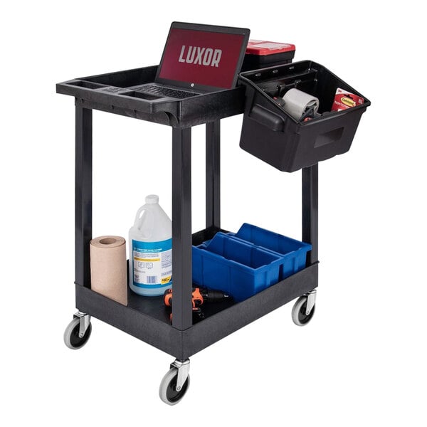 A black 24x18 utility cart with 2 shelves and bins holding a laptop and tools.