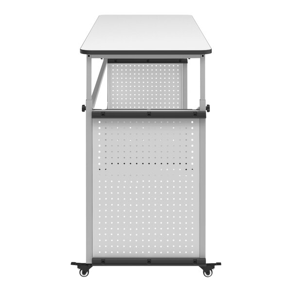 A white Luxor teacher desk with a black border on the top and wheels.