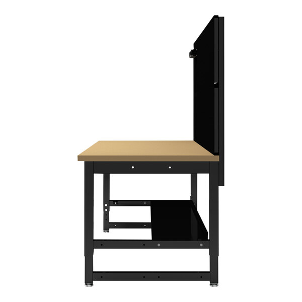 A Luxor industrial workbench with a black steel frame and natural wood top with a black shelf.