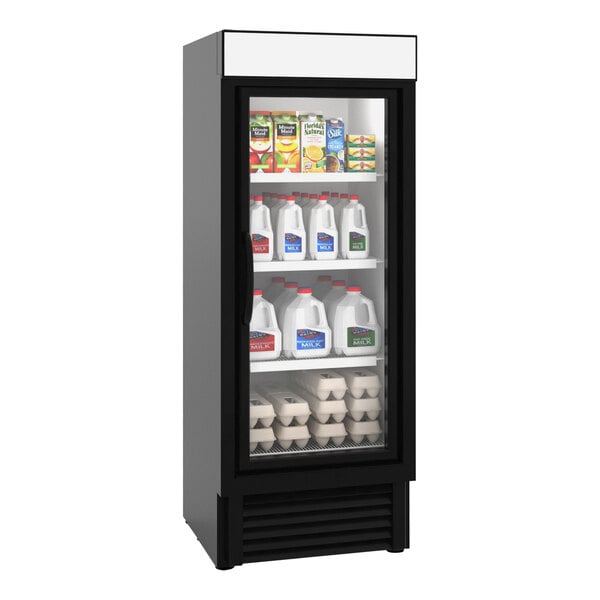 A black Hussmann refrigerated glass door reach-in merchandiser filled with milk and yogurt.