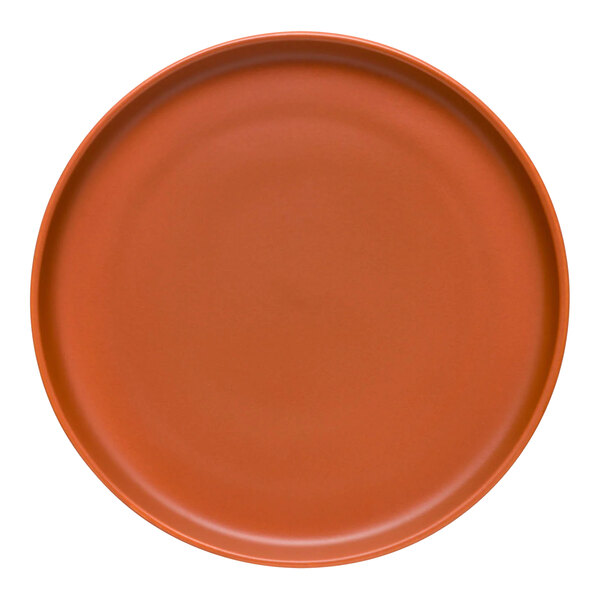 A close-up of a Libbey Driftstone Clay Satin Matte Porcelain Flat Coupe Plate with a brown rim.