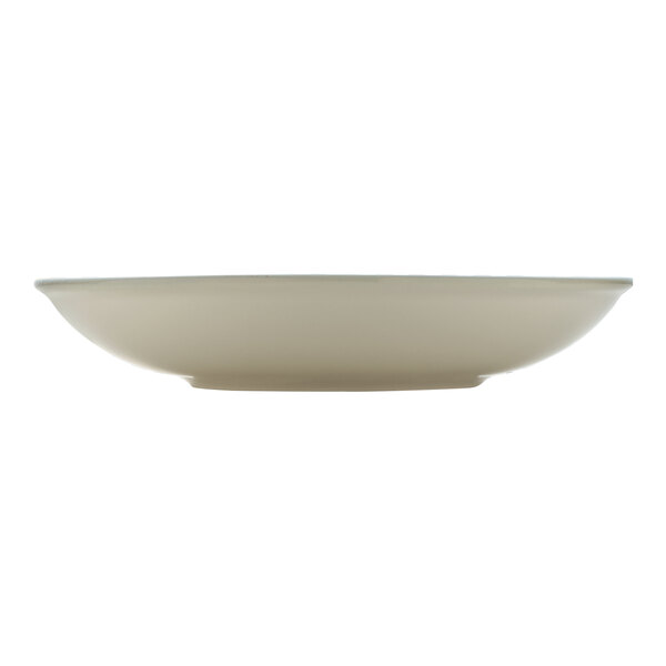 A white Heart & Soul porcelain bowl with a rim.
