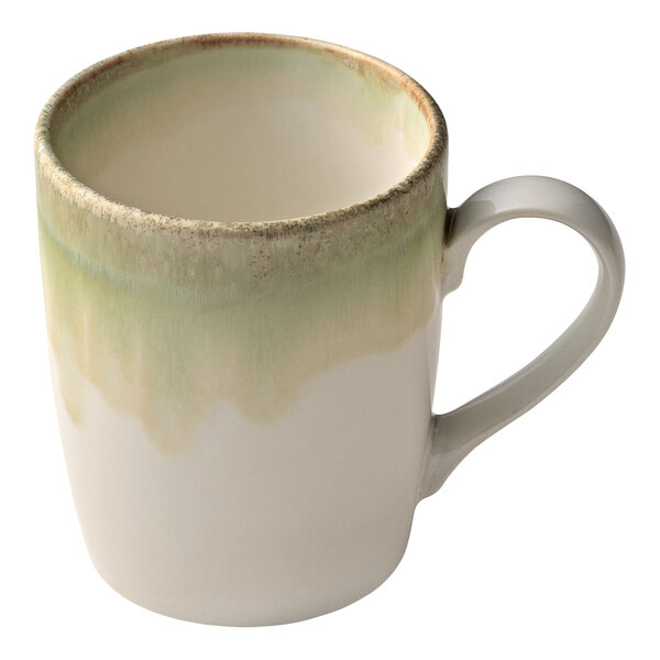 A white porcelain mug with a green Thyme design.