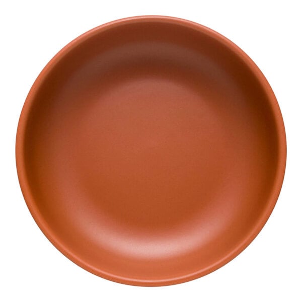 A close-up of a Libbey Driftstone clay porcelain low bowl with a matte finish.