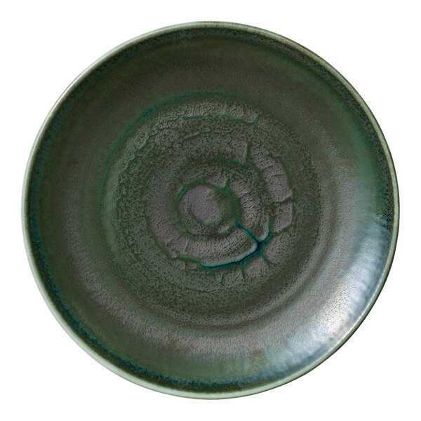 A green Heart & Soul porcelain coupe plate with a spiral pattern.