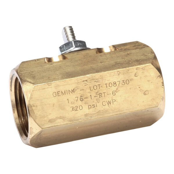 A close-up of a Frymaster brass drain valve.
