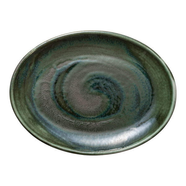 A close-up of a Heart & Soul avocado porcelain oval coupe platter with a swirl pattern.