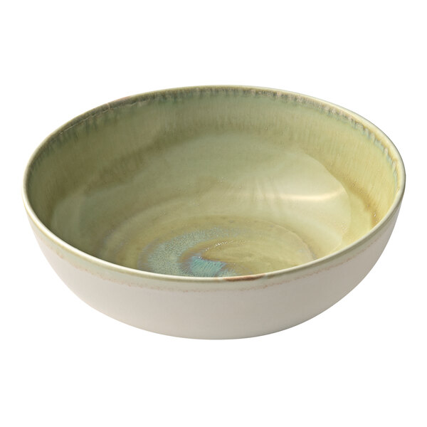 A Heart & Soul Thyme Porcelain serving bowl with a white rim and a circular surface.