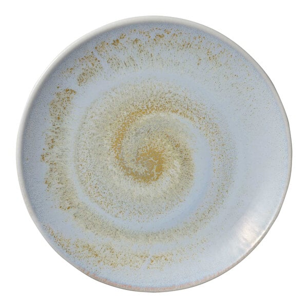 A white porcelain coupe plate with a blue spiral design.