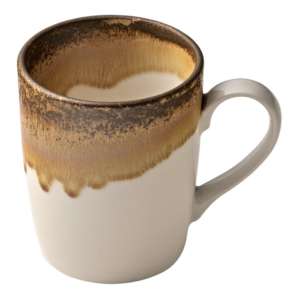 A white porcelain mug with brown and white swirls and a handle.