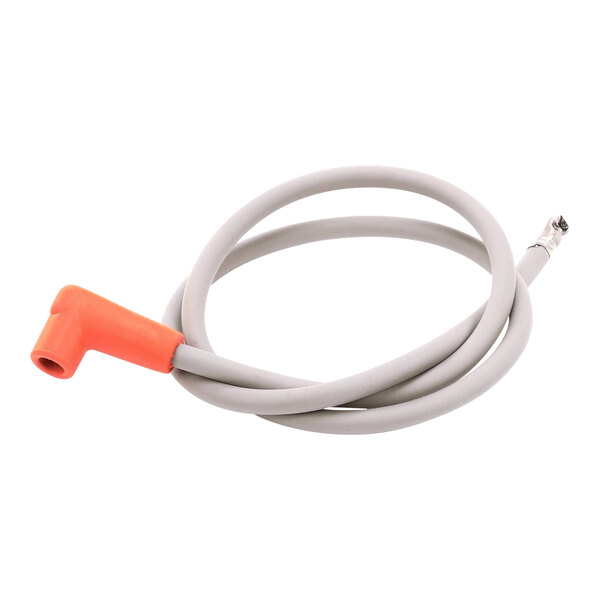 A close-up of a grey Frymaster ignition cable with an orange end.