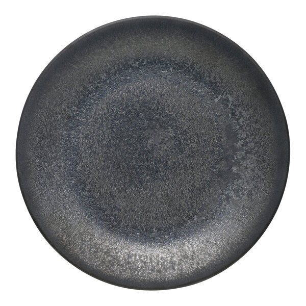 A close-up of a black matte porcelain coupe plate from Libbey.