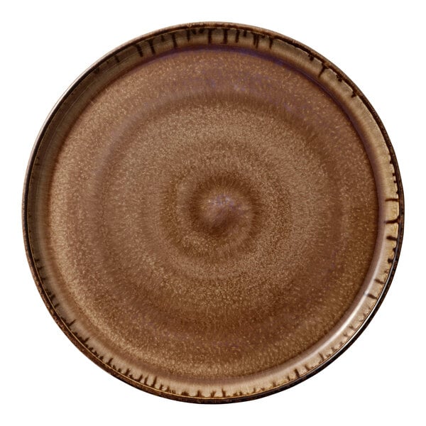 A brown porcelain plate with a raised spiral pattern on the rim.