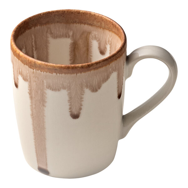 A white porcelain coffee mug with a brown heart design and a handle.