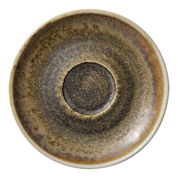 A Heart & Soul cumin porcelain saucer with a brown rim.