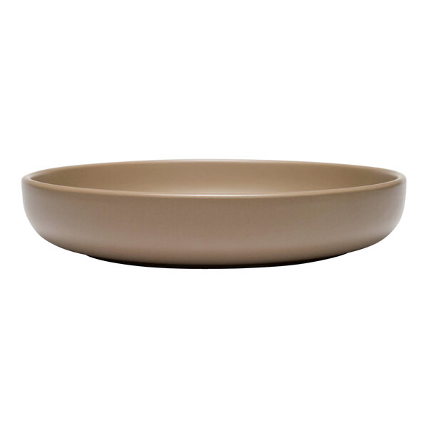 A close up of a Libbey Driftstone sand satin matte porcelain low bowl.