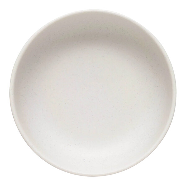 A white round Libbey Driftstone porcelain low bowl with a speckled surface.