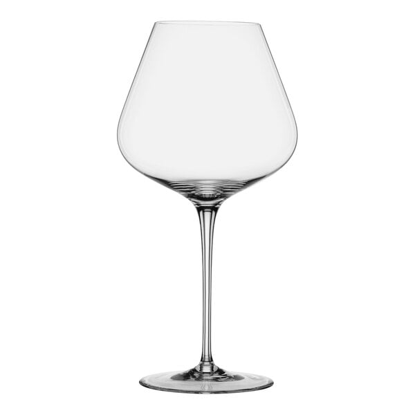 A clear wine glass with a long stem.