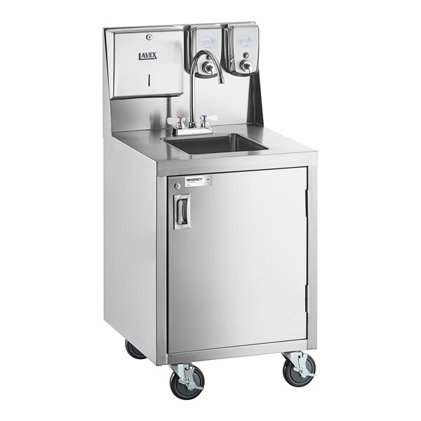 A stainless steel portable hand sink cart with a single bowl, gooseneck faucet, paper towel dispenser, soap dispensers, and four caster wheels.