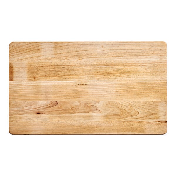 A wooden cutting board with rounded edges on a white background.