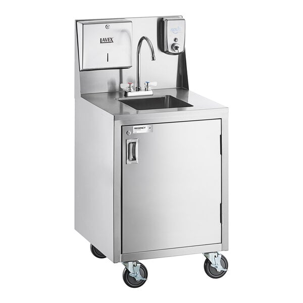 A stainless steel portable hand sink cart with a single bowl, gooseneck faucet, paper towel dispenser, soap dispenser, and cabinet on four caster wheels.