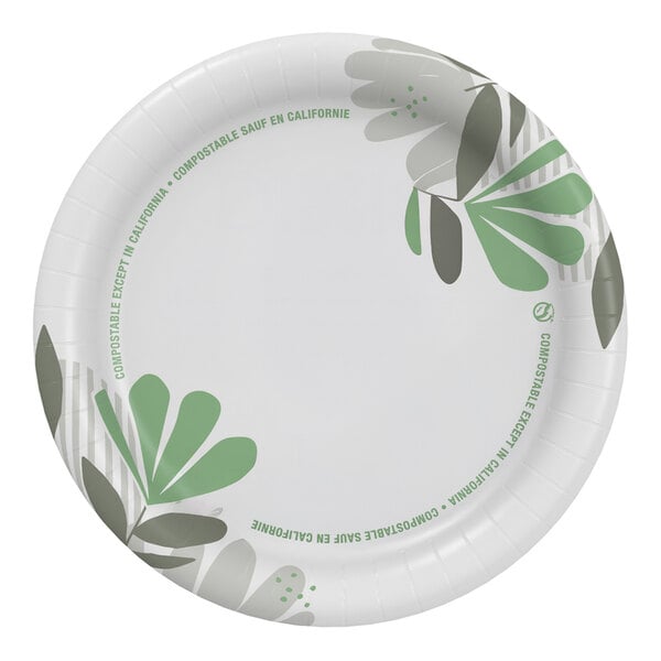 A Dixie paper plate with a green and white floral design.