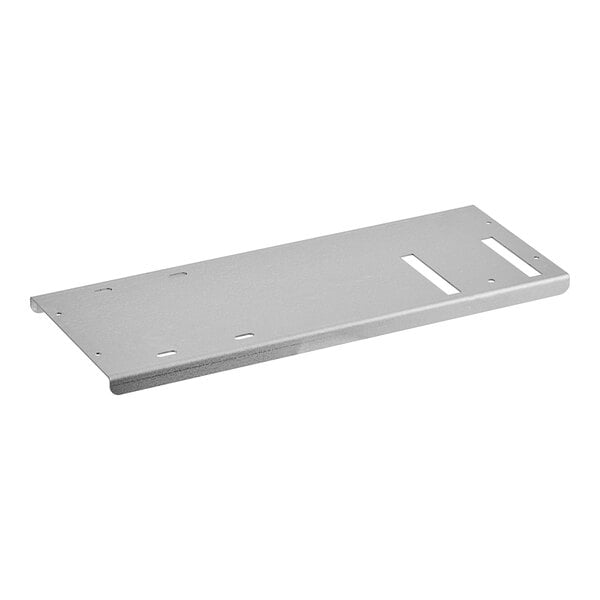 A white metal rectangular plate with a hole in the middle.