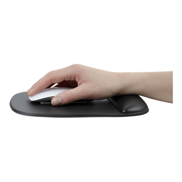 A hand using a mouse on a black StarTech mouse pad with wrist rest.