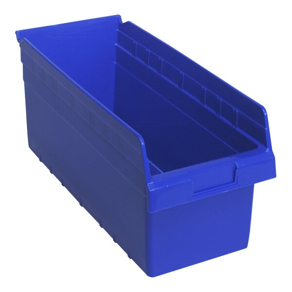 A blue plastic Quantum shelf bin with a lid.