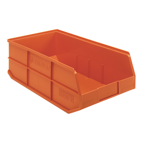 An orange plastic Quantum stackable shelf bin with text on the front.