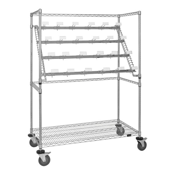 A Quantum carbon steel medical cart with wire shelves.