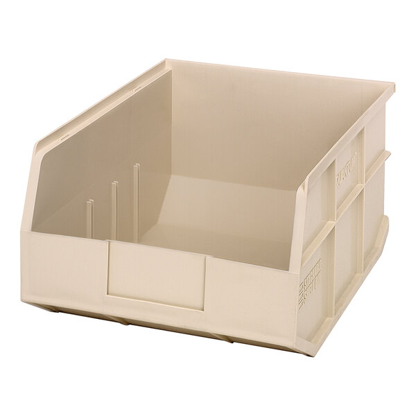 An ivory plastic Quantum stackable shelf bin with two compartments.