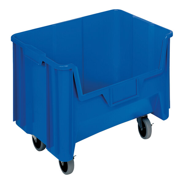 A blue plastic Quantum mobile storage container with wheels.