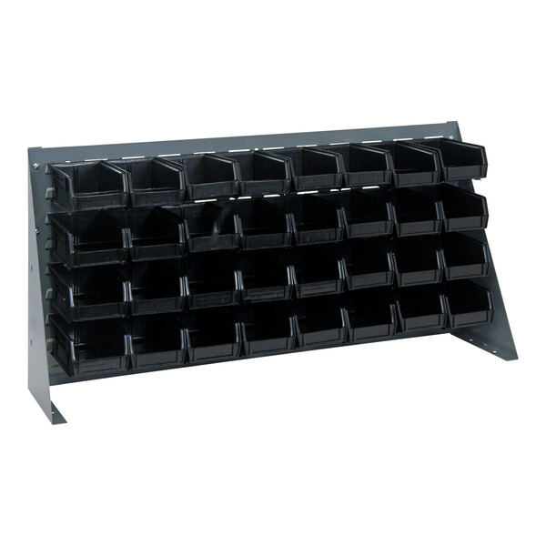 A gray steel Quantum bench rack with black bins on a white background.