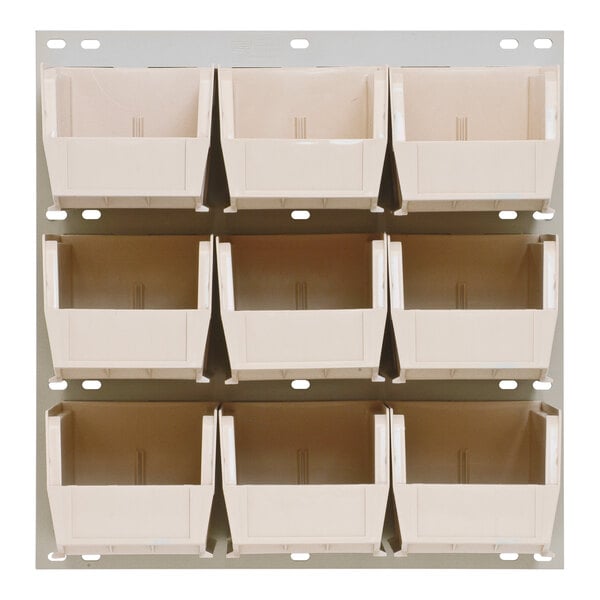 A Quantum white steel louvered panel with nine ivory bins.