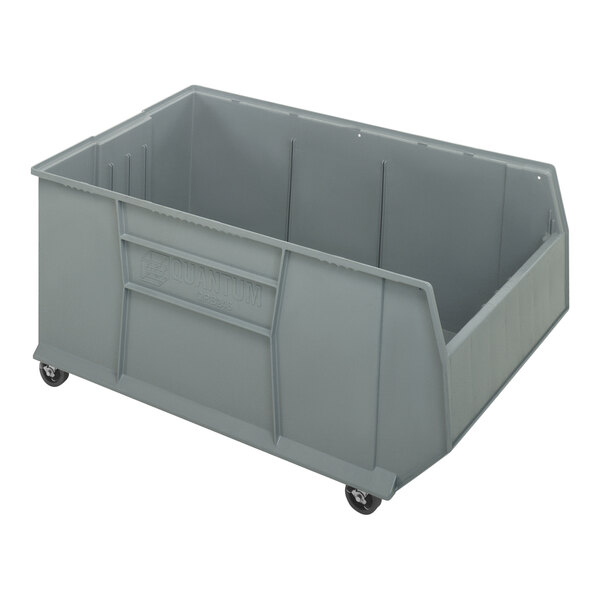 A grey plastic bin on wheels.