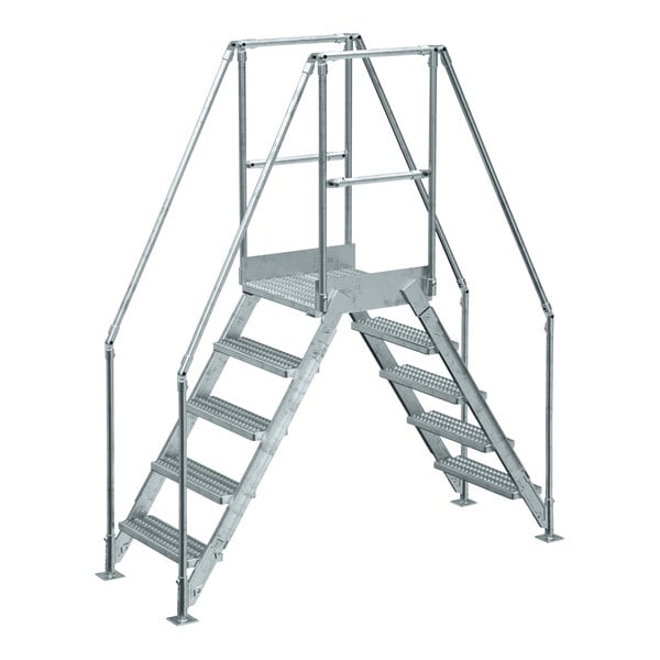 A Vestil galvanized steel crossover ladder with handrails and metal bars.