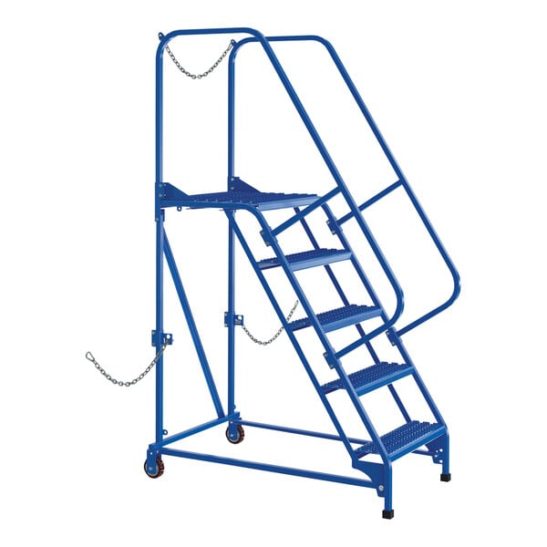 A blue Vestil steel semi-trailer access ladder with grip strut steps.