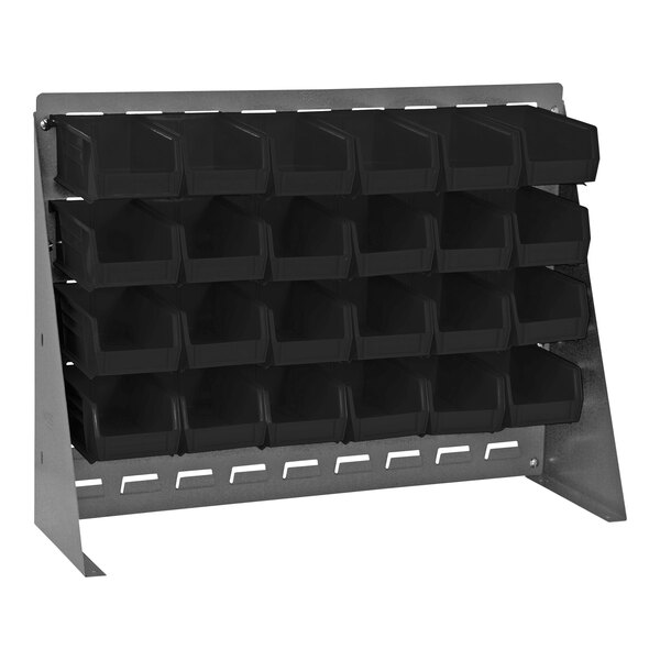 A gray steel bench rack with black bins on it.