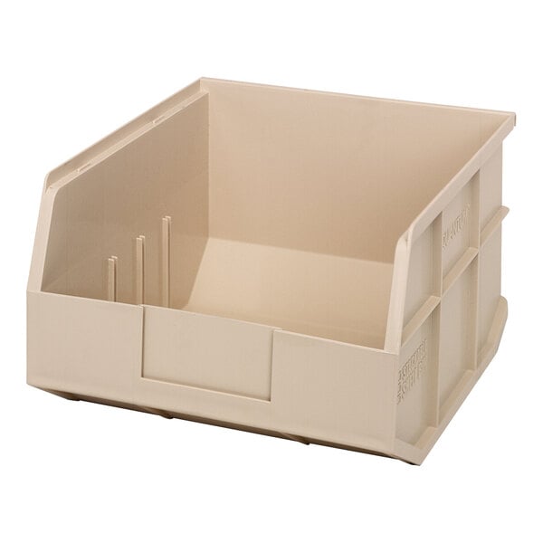 An ivory plastic Quantum shelf bin with two compartments.