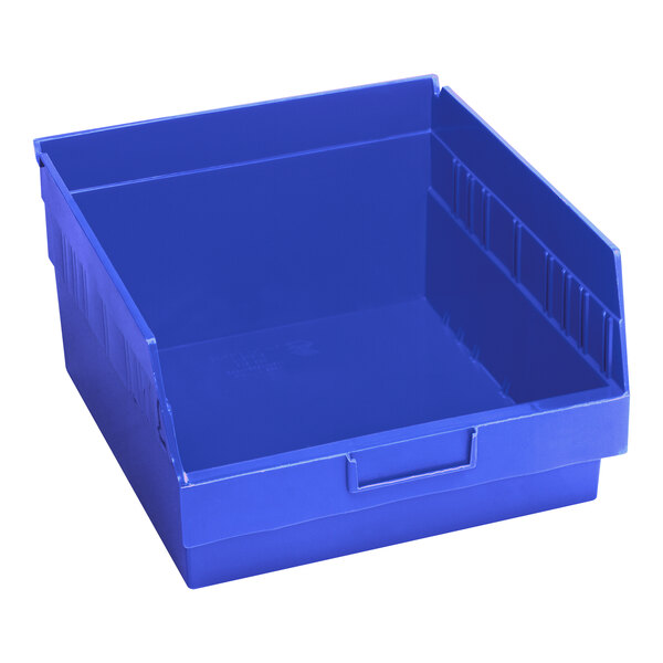 A blue plastic Quantum shelf bin with a handle.