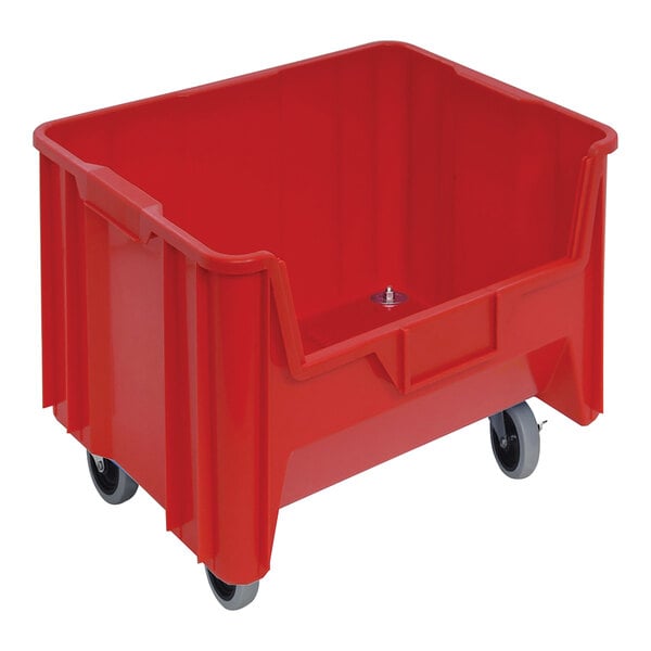 A Quantum red plastic storage container with wheels.